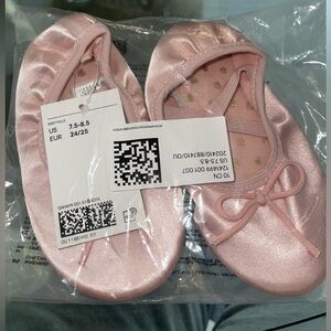 Pink ballerina shoes from H&M.